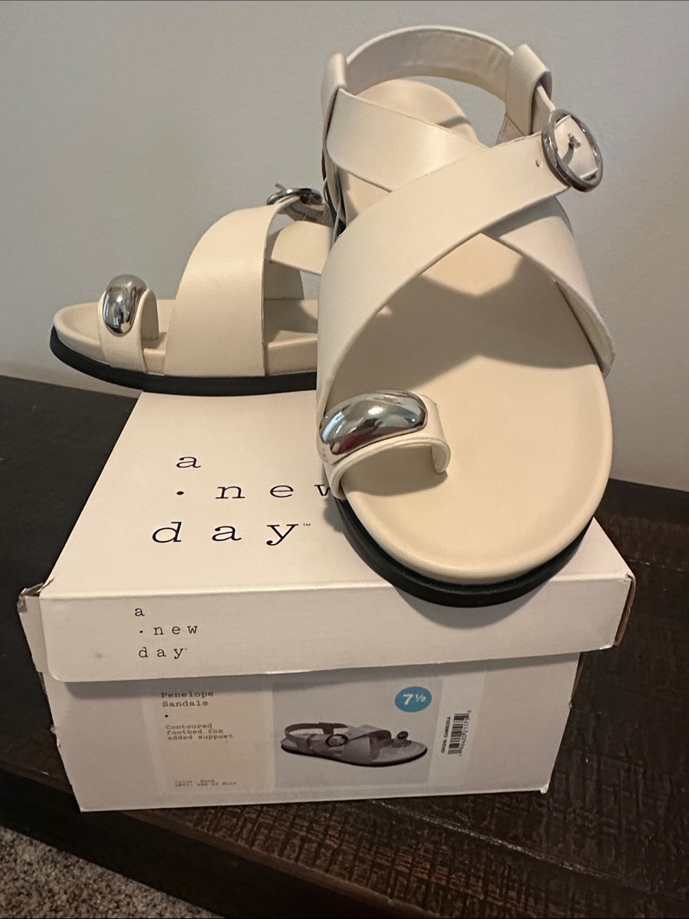 a new day Crisscross Buckle Sandals with Silver    Hardware Details.
